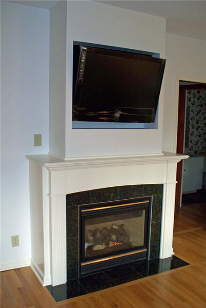 The addition of this built-in TV and gas fireplace allow this the seating in this room to be focused on one wall.