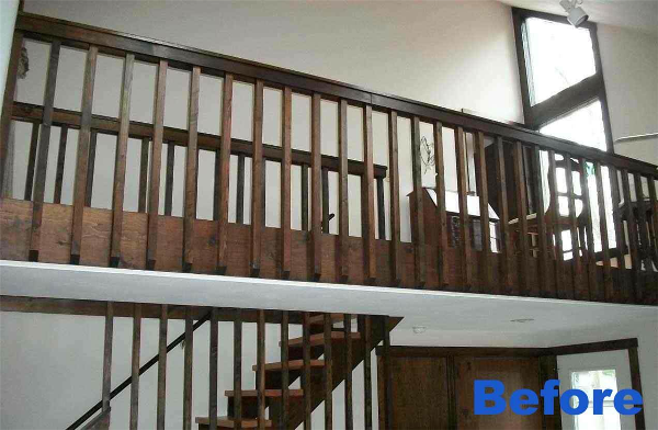 The dark stained pine railing in this home ran from the basement to the second story of the house.