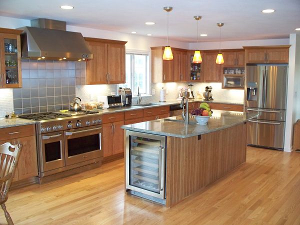 transitional kitchen with stainless steel appliances and island