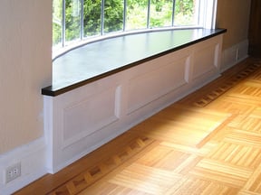 Decorative-Baseboard-and-Stone-Window-Seat