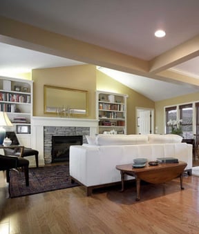 Open-Living-Room-with_Custom-Fireplace-Mantel-and-Bookshelves