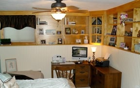 Small-Bedroom-with-Natural-Wood-Built-in-Shelving