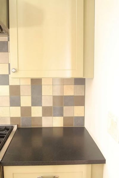 two-inch square kitchen backsplash tile