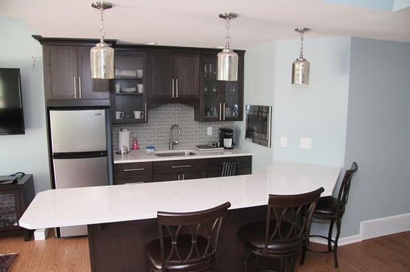 basement kitchen with bar seating