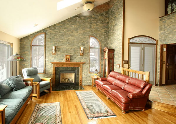 family room with stone veneer wall