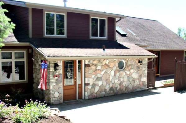 front entry with stone veneer facade