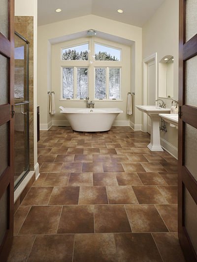master bathroom with ceramic tile flooring