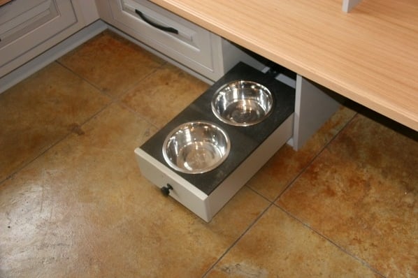 mudroom with pet bowl drawer