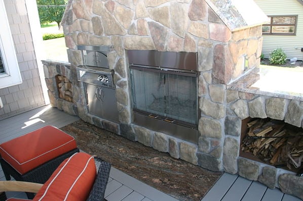 outdoor wood burning fireplace and pizza oven