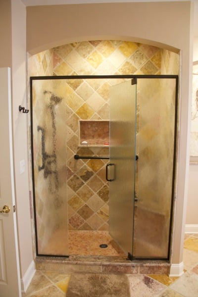 shower enclosure with frameless door