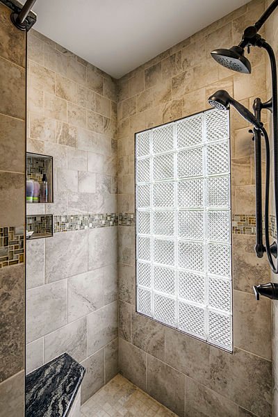 walk-in shower with glass block window