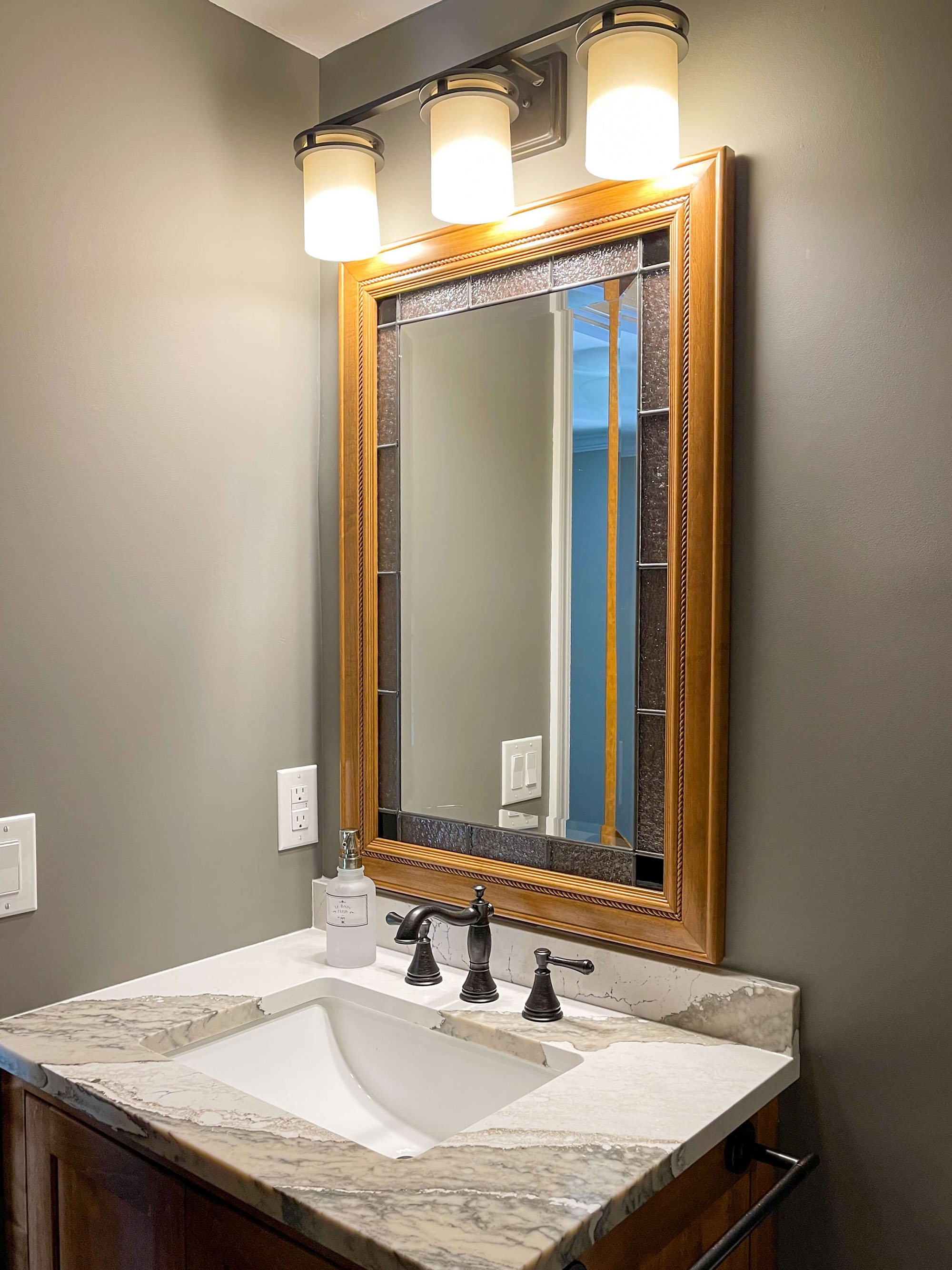 bathroom-remodel-gold-mirror-1