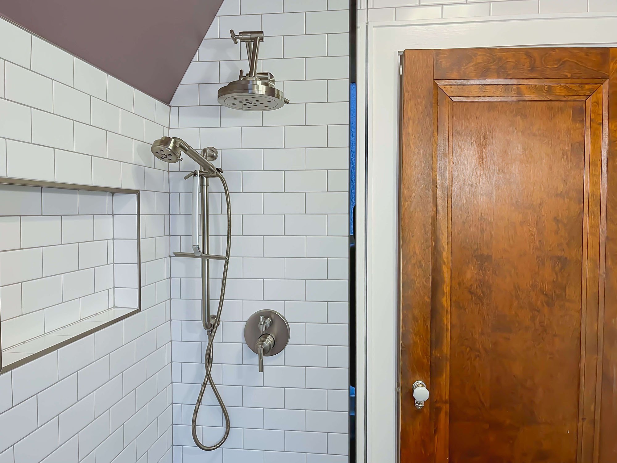 bathroom-remodel-subway-tile-wood-door-1