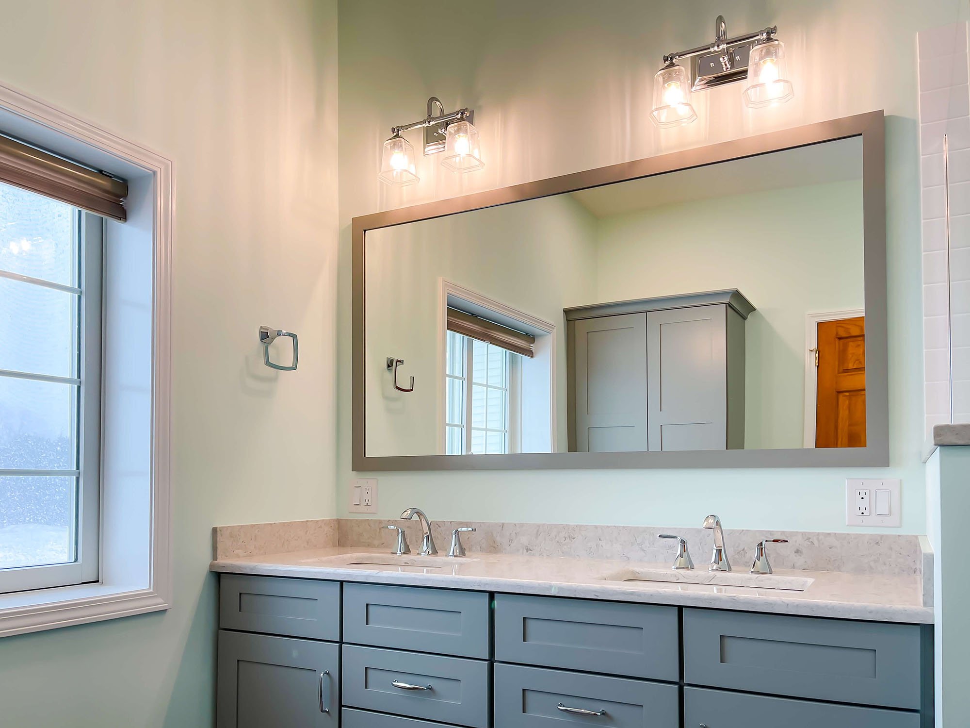 bathroom-remodel-wide-mirror-double-sinks-2