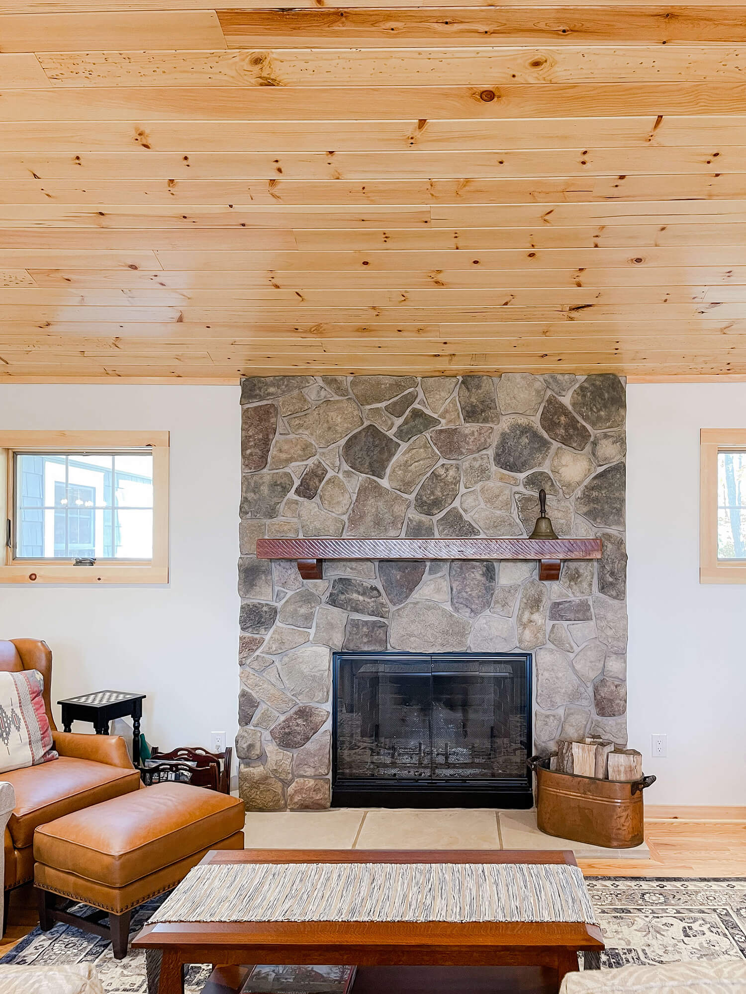 stone-fireplace-cozy-living-area-skaneateles-home