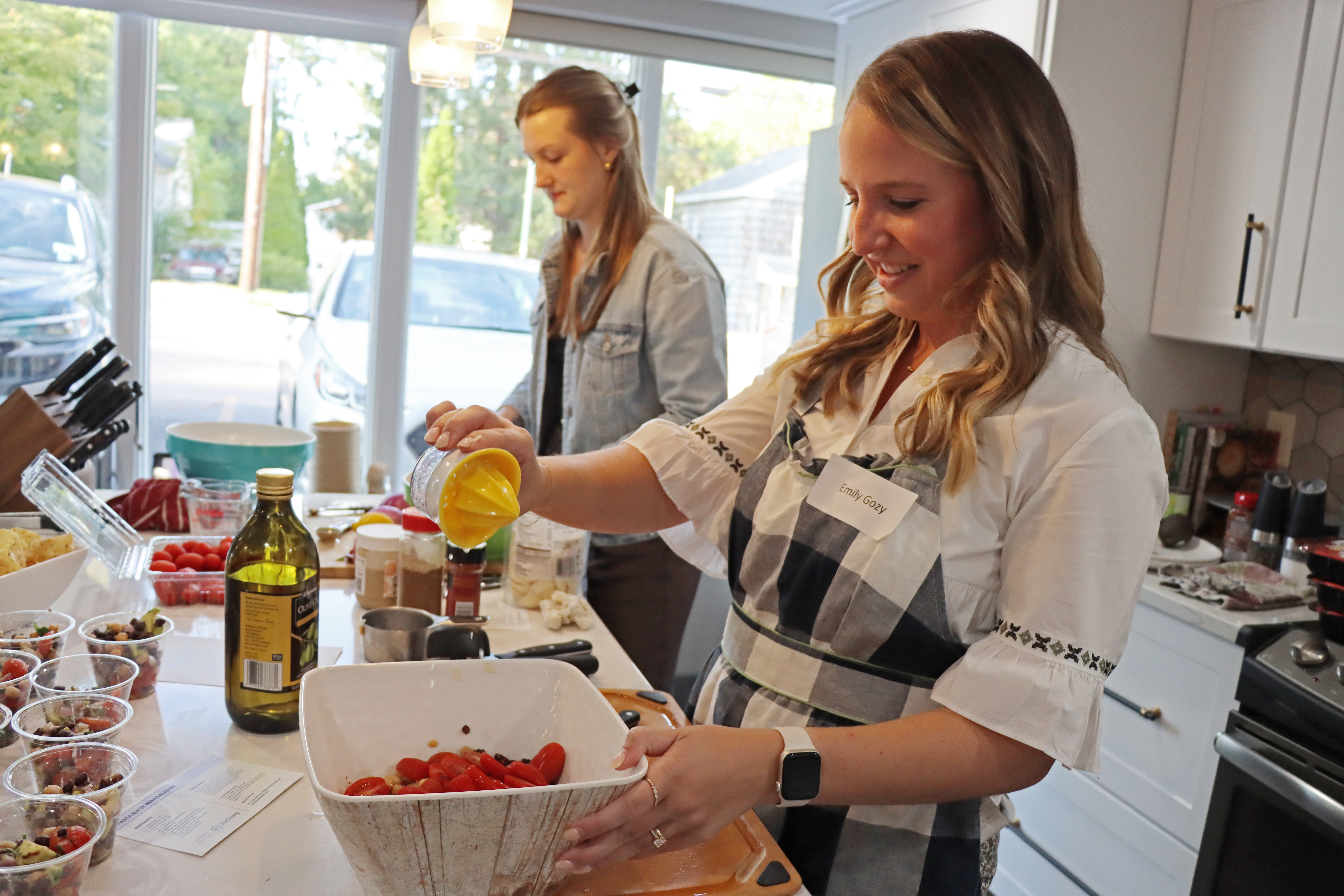 Emily Gozy preparing food at McClurg Kitchen Series 