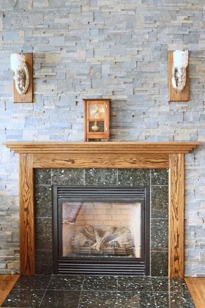 Fireplace-with-granite-tile-surround-and-hearth