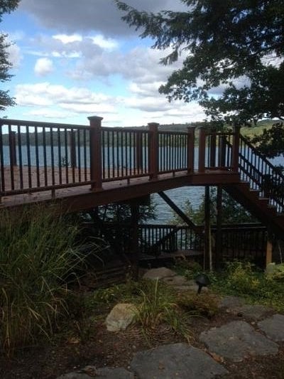 multi tiered deck with lake view
