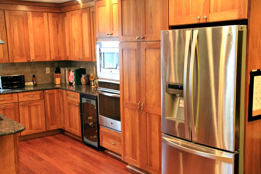 Shaker-style cabinets from Bishop Cabinets. A chef’s pantry was placed next to the refrigerator to provide ample food storage. Flooring is prefinished eco-friendly, durable bamboo.