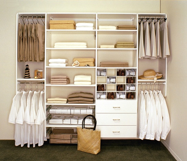 This closet storage system features shelves, rods, drawers and shoe compartment.