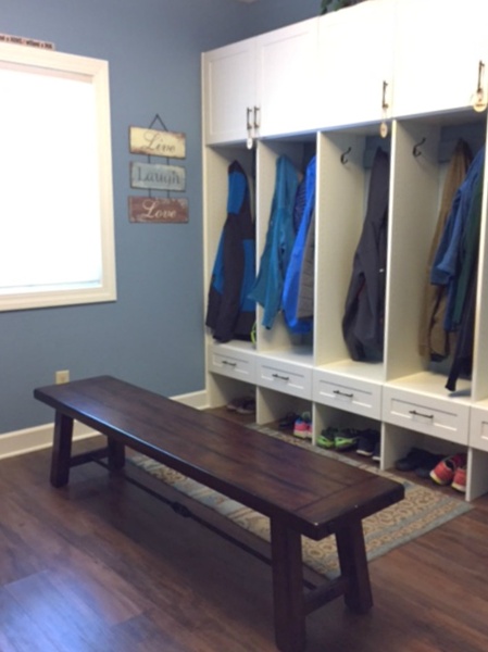 Built-in lockers with cabinets and drawers make it easy for family members to keep coats, jackets and shoes organized.